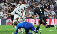 九游娱乐首页-包含皇马险胜曼联，双方交手异常激烈的词条